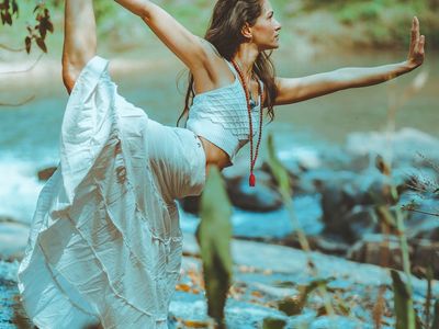 Person balancing gracefully during a yoga practice.